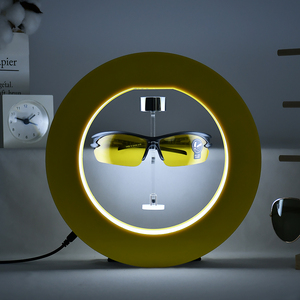 Support d'affichage de lunettes en acrylique flottant magnétique de forme ronde jaune, support rotatif lévitant pour lunettes de soleil, présentoir publicitaire - Product Image 5