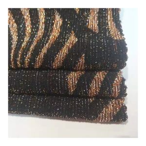Tela de punto jacquard de LICRA de nylon de hilo metálico dorado teñido liso personalizado popular chino con lurex para prendas de vestir - Product Image 1