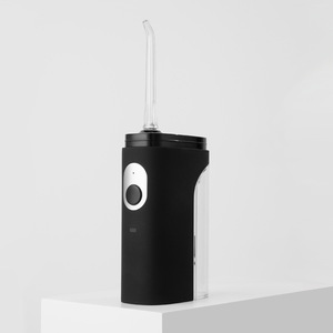 Irrigador Dental Eléctrico Portátil Goldfish Water Flosser W06 Mini, Impermeable IPX7, Bomba de Pistón, Blanco, Borgoña, Negro - Product Image 2