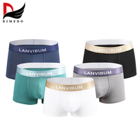 Ventes en gros de sous-vêtements pour hommes OEM, boxers de marque personnalisés, sous-vêtements en coton respirant, boxers confortables pour hommes