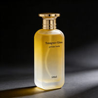 Vente en gros de flacons de parfum en verre transparent cylindriques personnalisés de 50 ml, 70 ml, 100 ml avec atomiseur et pompe