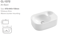 Conception avant-gardiste articles sanitaires blanc Surface lisse évier vasque en céramique évier en forme de roche comptoir salle de bain lavabo pour hôtel