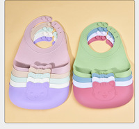 Nouveau fabricant de produits pour bébés Bavoir à riz en silicone personnalisé pour nourrissons Bavoirs alimentaires imperméables pour animaux et chats Patten pour bébés