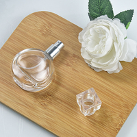 Flacon de parfum en verre transparent rond rechargeable de 25 ml avec pompe pulvérisatrice, sérigraphie, diffuseur de roseaux portable pour voyage