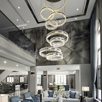Lustre suspendu LED de luxe personnalisé en cristal, design ovale allongé, hauteur réglable, fonction dimmable, idéal pour villa, hôtel, escalier