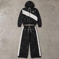 Ensemble décontracté deux pièces pour homme, haut à manches longues zippé noir et blanc avec blocs de couleur et pantalon à cordon de serrage, OEM ODM