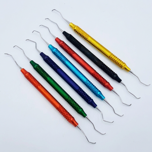 7 pièces ensemble dentaire en acier Source d'alimentation manuelle Kit de poignée en Silicone remplissage Composite spatules en résine certifié CE par Ortho Genix - Product Image 1