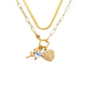 Bracelet fin à breloques plaqué or 18 carats avec pendentif fleur et cœur en perle, idéal pour le quotidien - Product Image 5