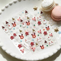 Autocollants pour ongles de Noël 5D autocollants en relief avec texture de Père Noël, de pain d'épices, d'élk et de flocon de neige, décorations pour manucure DIY
