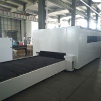 Machine de découpe laser à fibre Hoysook 3000w 6000w entièrement fermée avec table d'échange pour la découpe de tôles
