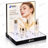 Support d'affichage cosmétique en acrylique LED personnalisé avec éclairage double et fond interchangeable pour comptoir de maquillage