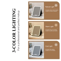 Miroir cosmétique de bureau pliable en cuir PU Miroir LED de maquillage portable à angle réglable avec trois lumières de couleur