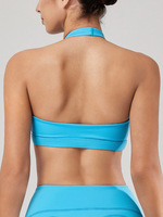 Soutien-gorge de sport respirant à séchage rapide, col en V torsadé, maintien moyen, dos ouvert, ourlet large, rembourrage amovible, idéal pour le yoga et la gym