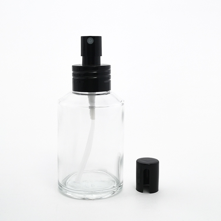 Bottiglia trasparente con spray nero