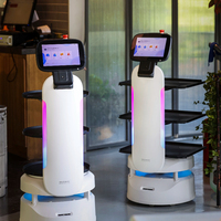 Robot de livraison commercial intelligent Humanoïde Robot de restauration programmé par l'IA Télécommande Livraison automatique de cascades