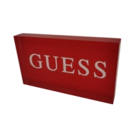 Blocs publicitaires personnalisés en acrylique rouge avec logo de marque DNY et lettres blanches, fabriqués à Guangdong