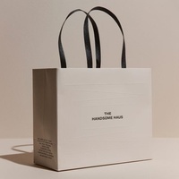 Sacs shopping en papier avec poignée, sacs shopping en papier personnalisés avec logo pour l'emballage de boutiques de détail