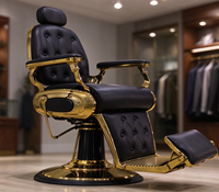 Fauteuil de Barbier de Luxe Noir Capitonnage Boutonné avec Cadre Métallique Doré, Inclinable Hydraulique et Pivotant à 360° pour Salon de Coiffure
