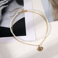 Collier ras du cou Double couche pour femme, style bohémien, coquillage en perles et coquillage, coquillage festonné de plage, bijoux pour fille de l'océan, collection