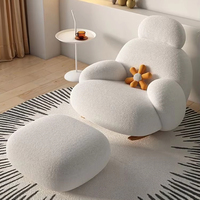 Fauteuil inclinable moderne avec fonction de balancement et accoudoirs, idéal pour salon, chambre ou hôtel