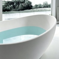 Baignoire autoportante moderne en pierre artificielle à surface solide avec fonction de trempage, disponible en plusieurs couleurs pour salle de bain d'appartement