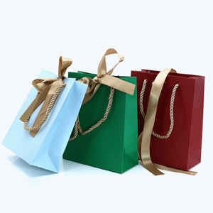 Custom Logo <b>Bow</b>-knot Recycled Materials Paper Bag Ribbon Handle Cardboard Packaging Tote Bags Bolsas <b>Gift</b> Paper Shopping Bag - Product Image 1