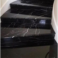 Pièces d'escalier en marbre noir naturel Nergo Marquine pour escaliers courbes de villa