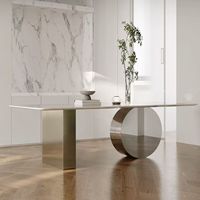 Table à manger multifonctionnelle minimaliste italienne haut de gamme avec pieds en métal et plateau en marbre artificiel pour la maison et les restaurants