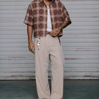 Chemise courte boutonnée à carreaux effilochés, style vintage, texturée, à manches courtes, streetwear