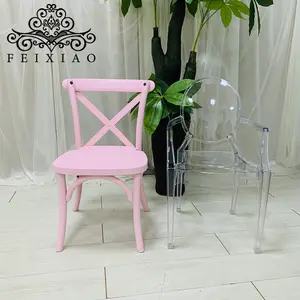 Chaise rose empilable en plastique à dos croisé pour bébé, vente en gros