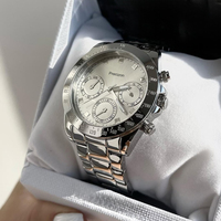 Montre chronographe à quartz pour femme, lunette fixe, cadran texturé or rose, plusieurs sous-cadrans, aiguilles lumineuses, bracelet en métal