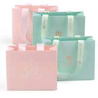 Petit sac en papier bronzant respectueux de l'environnement ruban imprimé Logo sac à main pour bijoux Ins cadeaux recyclable