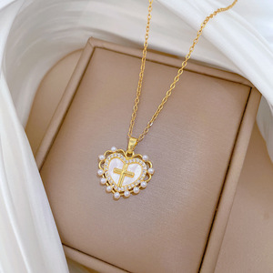 Collar de Moda con Colgante de Cruz de Perlas y Corazón Ondulado, Chapado en Oro, Cadena de Acero Inoxidable, para Hombres, Mujeres, Unisex, Joyería Budista - Product Image 1
