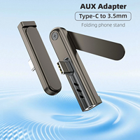 Support de téléphone de bureau compact 2-en-1 à design coudé avec adaptateur USB-C pour chargement rapide et visionnage