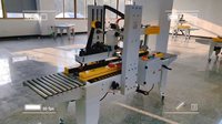 Machine de fermeture et d'étanchéité automatique de boîtes en carton, petite, électrique, avec tête de ruban adhésif de 50 mm pour les applications de boissons et de produits chimiques