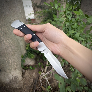 Navaja Plegable Portátil de Apertura Manual con Bloqueo de 8.54'' y Hoja de Acero D2 de 3.3'', Mango G10 con Funda de Cuero Negro, Navaja de Bolsillo EDC - Product Image 1