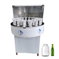 Laveuse automatique de bouteilles à 32 têtes pour le rinçage interne des bouteilles en PET et de bouteilles en verre rondes