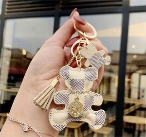 2025 Hot Sale Cartoon Teddy Bear Faux Leather Tassel Keychain Key Ring High Quality PU Leather Cute Bear Mini <b>Bag</b> Charm Keychain - Product Image 4