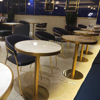 Hôtel nordique moderne luxe métal PU cuir rembourré chaise de salle à manger de luxe Table en marbre ensemble groupe pour 4 personnes
