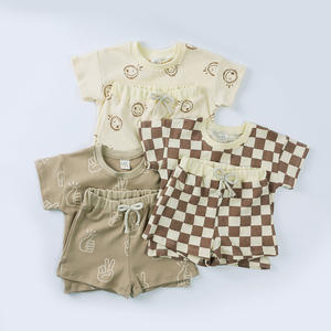 Set di t-shirt e pantaloncini in cotone biologico per bambini estivi con stampa a quadri con sorriso per ragazzi e ragazze Set di <span class=keywords><strong>abbigliamento</strong></span> Casual per bambini - Product Image 1