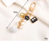 Porte-clés vintage élégant pour fille, sac à main avec pendentif en métal pour casque, sac à main pour écouteurs, accessoires, cadeau