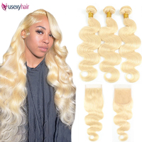 Paquetes de cabello humano ondulado de color rubio miel 613 vietnamita crudo de 30 pulgadas 100% extensiones de trama de tejido de cabello Virgen sin procesar