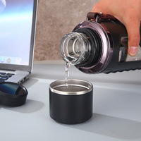 Bouteille d'eau en verre borosilicate 1L avec manchon protecteur en silicone avec infuseur à thé