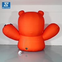 Ours de football personnalisé gonflable Anime personnage d'animal de dessin animé Sculpture gonflable pour la décoration d'événements commerciaux