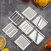 Groothandel Nieuw Geüpgradede 7-blads Interchangeable Multifunctionele Groentesnijder Set: Schijft, Rasp, Schilmesjes en Aardappelschillers