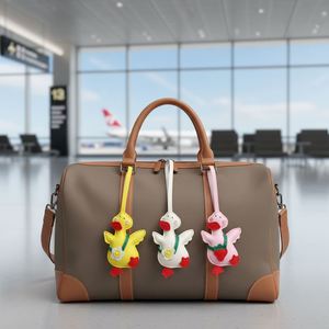 Encantador Llavero de Pato de Dibujos Animados de Cuero PU, Accesorio Portátil de Moda para Mochila con Correa Ajustable, Bonito Colgante Promocional - Product Image 1