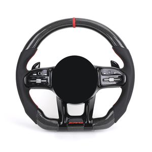 Volante in Pelle Nera Semi-Perforata con Inserti in Carbonio per W213 C238 W463 W464 W222 C217 <span class=keywords><strong>CLS</strong></span> <span class=keywords><strong>C257</strong></span> W205 C63 AMG - Product Image 1