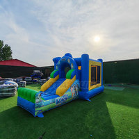 Château gonflable bleu pour location événementielle, château gonflable extérieur avec toboggan, château de saut pour enfants motif chien de dessin animé à vendre