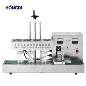 เครื่องปิดผนึกฟอยล์ด้วยระบบเหนี่ยวนำแม่เหล็กไฟฟ้าอัตโนมัติ, เครื่องปิดฝาขวดแบบต่อเนื่องสำหรับบรรจุภัณฑ์น้ำมันอาหารและเครื่องสำอาง - Product Image 1