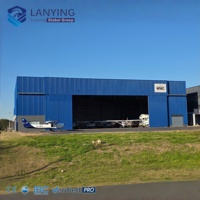 Hangar Prefabricado de Acero para Aviones en Argentina, con Sistema de Techo de Alta Resistencia para Operaciones de Servicio Aéreo